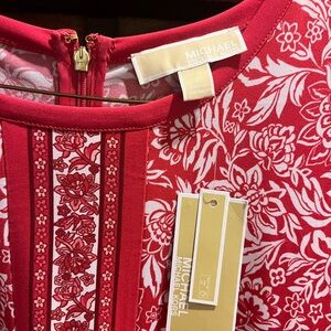 Brand new Michael Kohrs dress. Never worn.